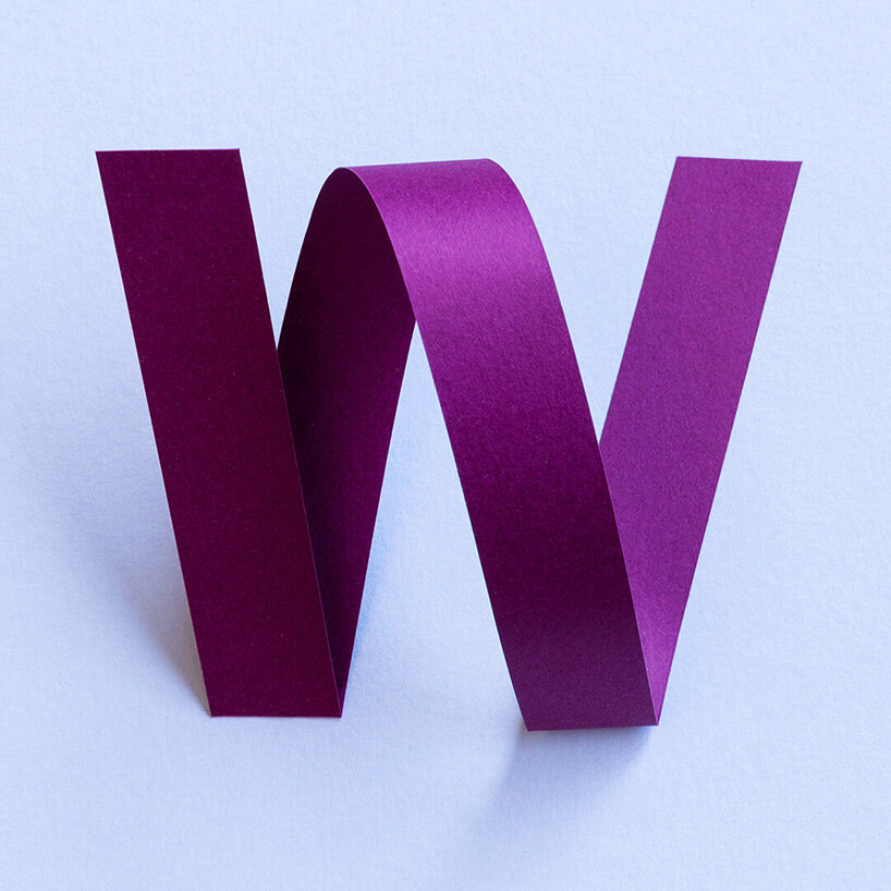 reina takahashi folds and twists paper strips to form calligraphic character series