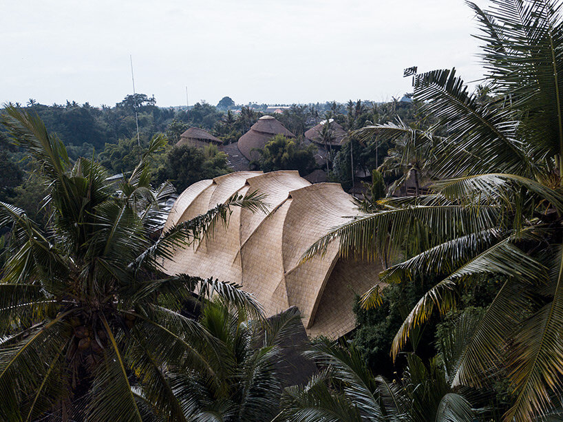 draping roof tops lightweight bamboo structure by IBUKU for green school in bali, indonesia