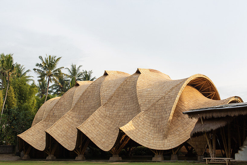 draping roof tops lightweight bamboo structure by IBUKU for green school in bali, indonesia