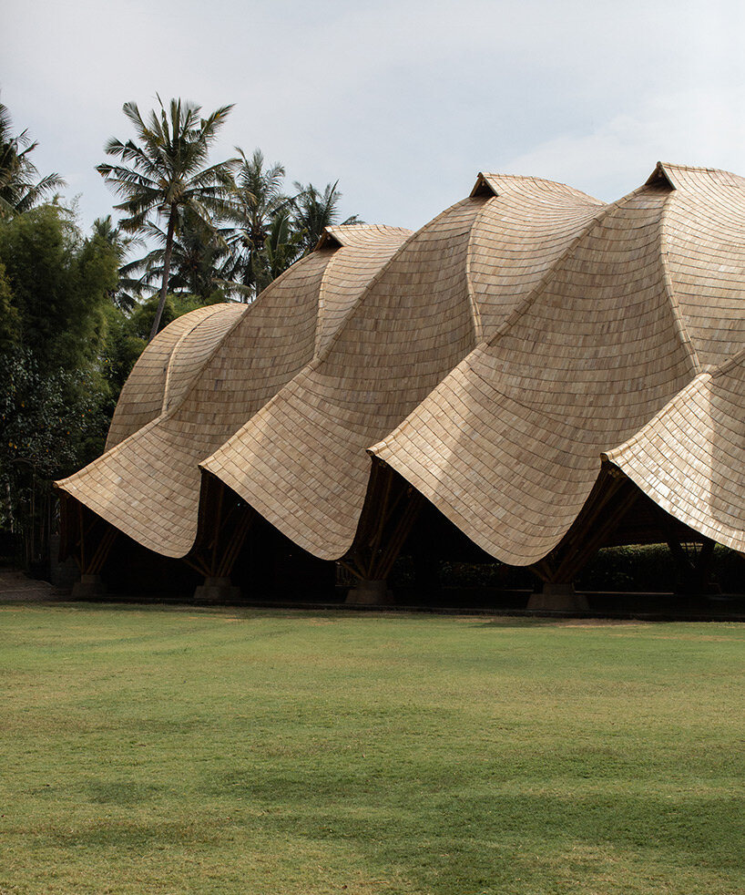 draping roof tops lightweight bamboo structure by IBUKU for green school in bali, indonesia