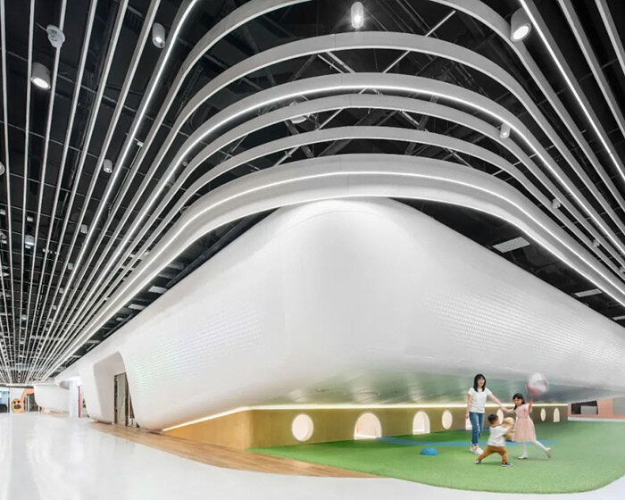 DUTS design installs infinite 'mobius ring' in beijing shopping mall with large-scale kids town