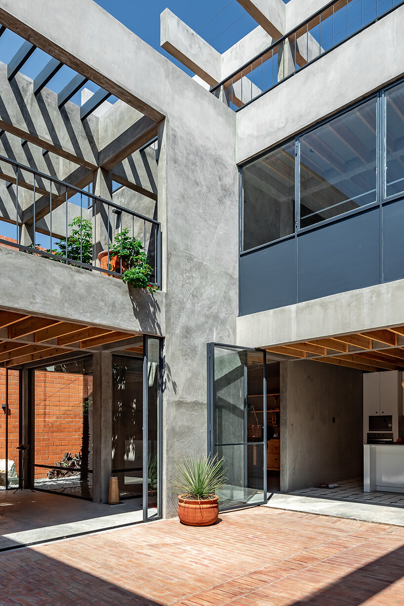 well-lit central patio blurs the boundaries within 'nuestro sueño' house in mexico