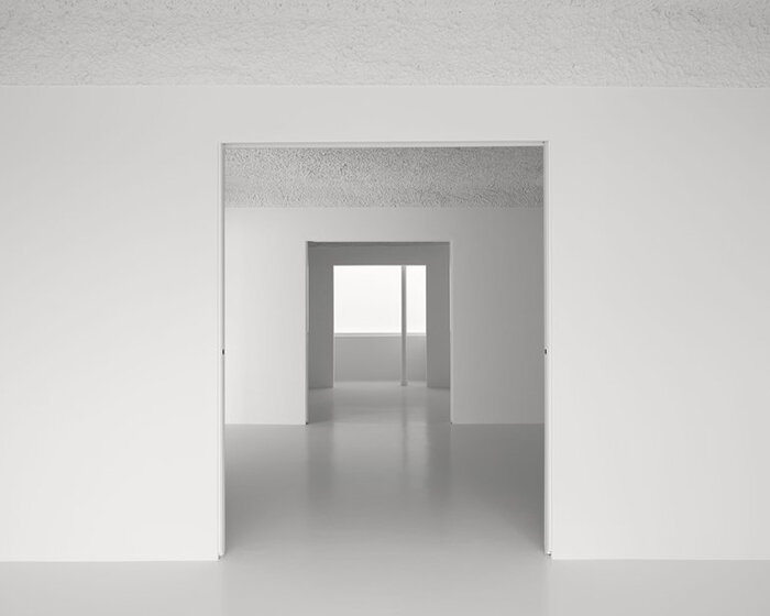 HANGHAR negates architecture in bare, abstract house responding to social standards