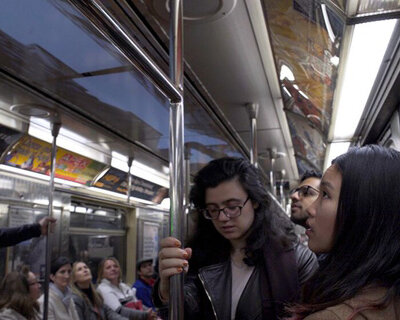 ian callender projects new york cityscape on the ceiling of moving subway trains