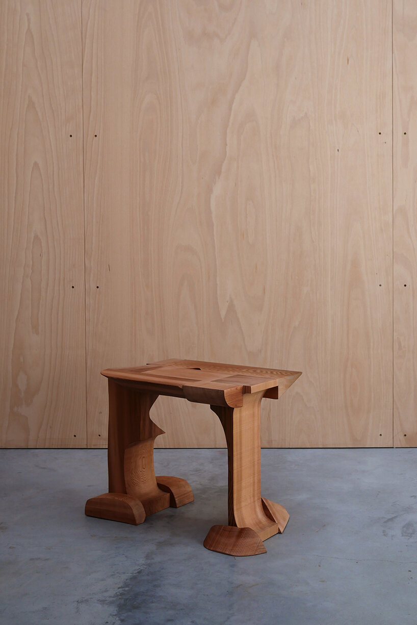 max lamb exhibits puzzle-like wooden furniture along chairs in stone at salon 94 design