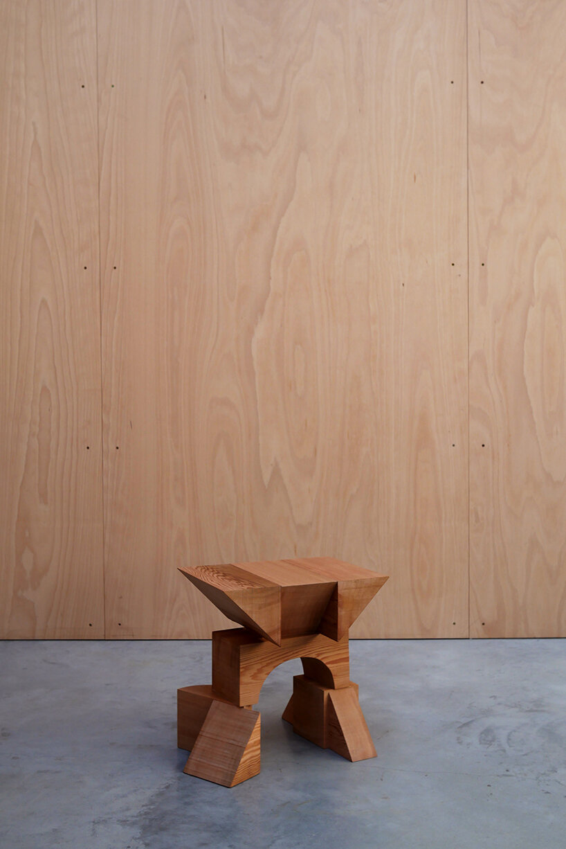 max lamb exhibits puzzle-like wooden furniture along chairs in stone at salon 94 design