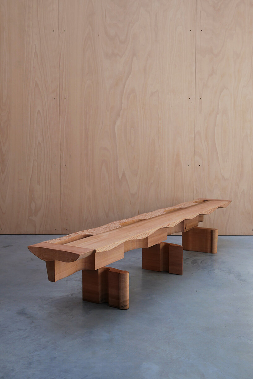 max lamb exhibits puzzle-like wooden furniture along chairs in stone at salon 94 design