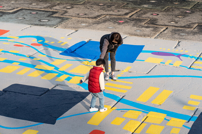 migliore + servetto covers a 500-meter-long coastal strip in south korea with colorful and vibrant marine world patterns