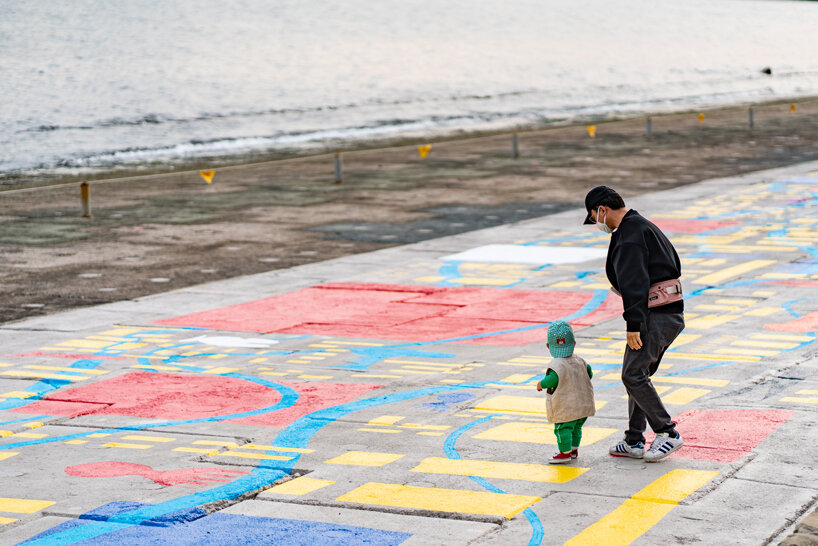 migliore + servetto covers a 500-meter-long coastal strip in south korea with colorful and vibrant marine world patterns