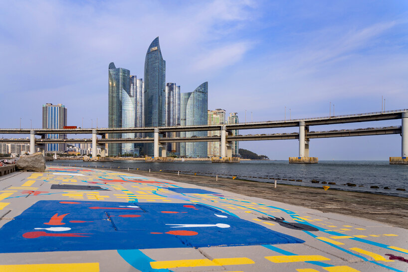 migliore + servetto covers a 500-meter-long coastal strip in south korea with colorful and vibrant marine world patterns
