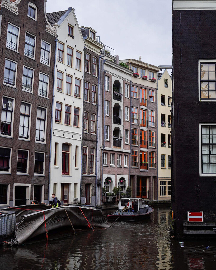 3D printed steel bridge installed over one of amsterdam's oldest canals