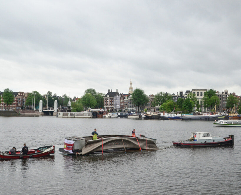 3D printed steel bridge installed over one of amsterdam's oldest canals