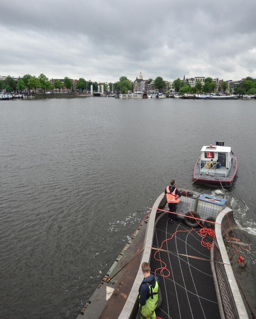 3D printed steel bridge installed over one of amsterdam's oldest canals