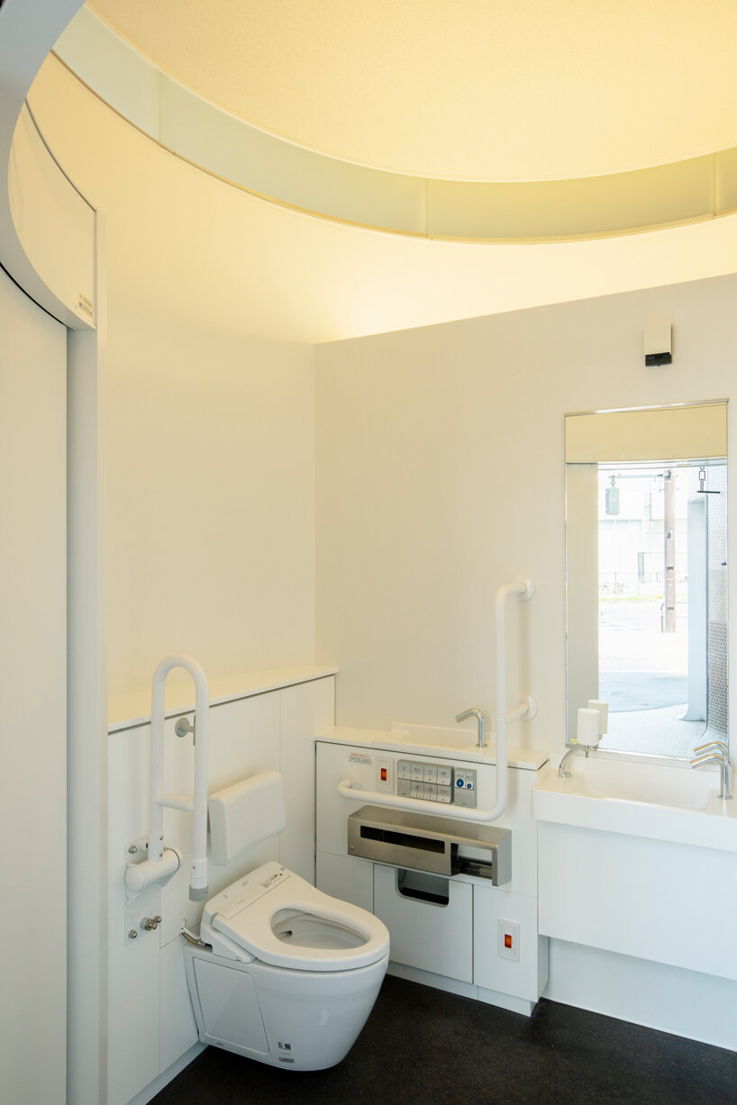 toyo ito's tokyo toilet appears like three mushrooms sprouted in the woods designboom