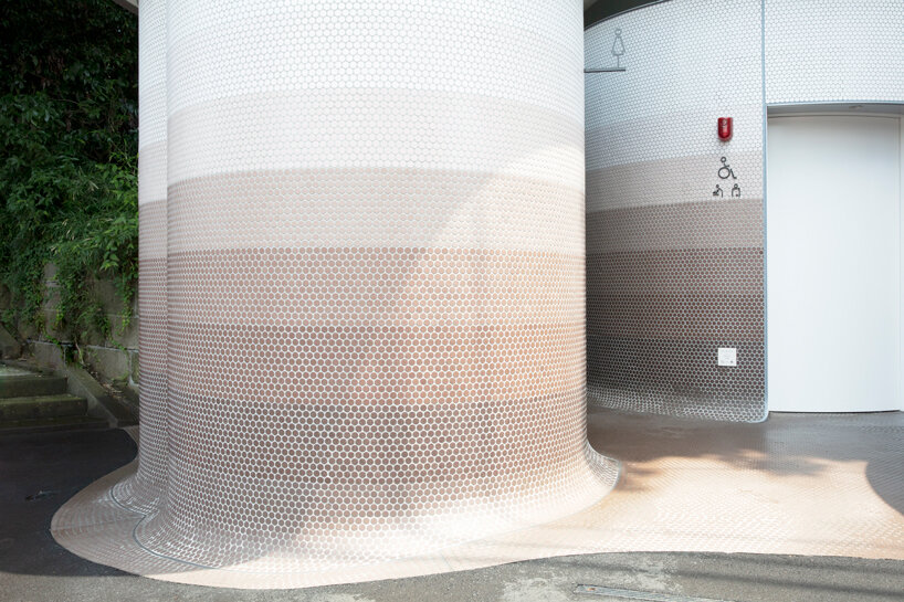 toyo ito's tokyo toilet appears like three mushrooms sprouted in the woods designboom