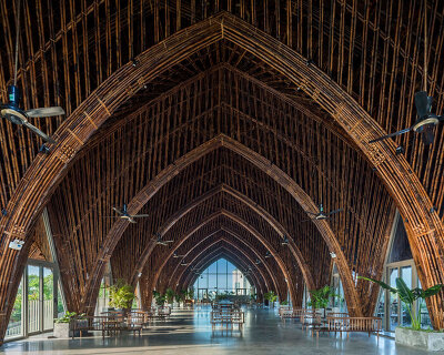 VTN designs 9-meter-tall vaulted bamboo ceiling for casamia community house in vietnam