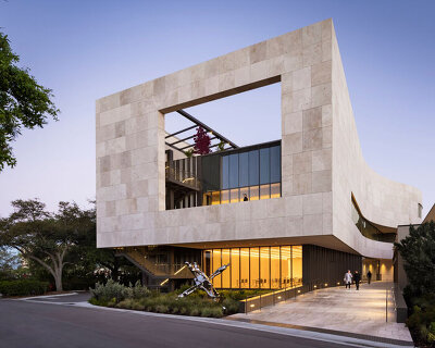 weiss/manfredi restores hurricane-damaged museum in florida with curved stone exterior