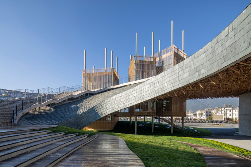 yangliping performing arts center by studio zhu pei is cantilevered on chinese mountain