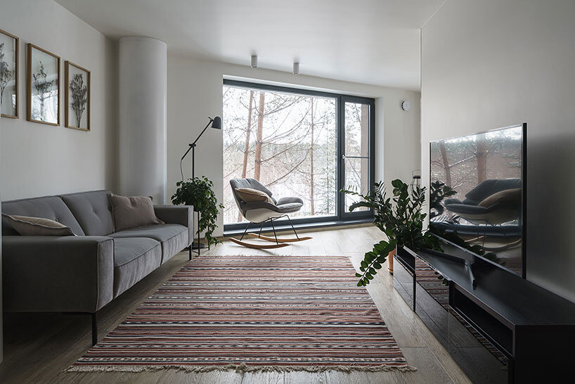 monolithic 'forest view' house appears to float among the woods of russia - 3