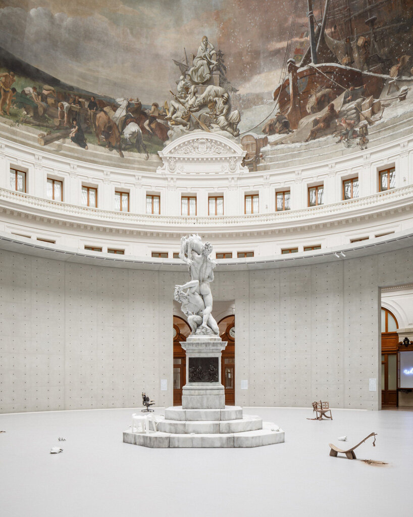 urs fischer ephemeral wax sculptures are burning inside the bourse de commerce in paris
