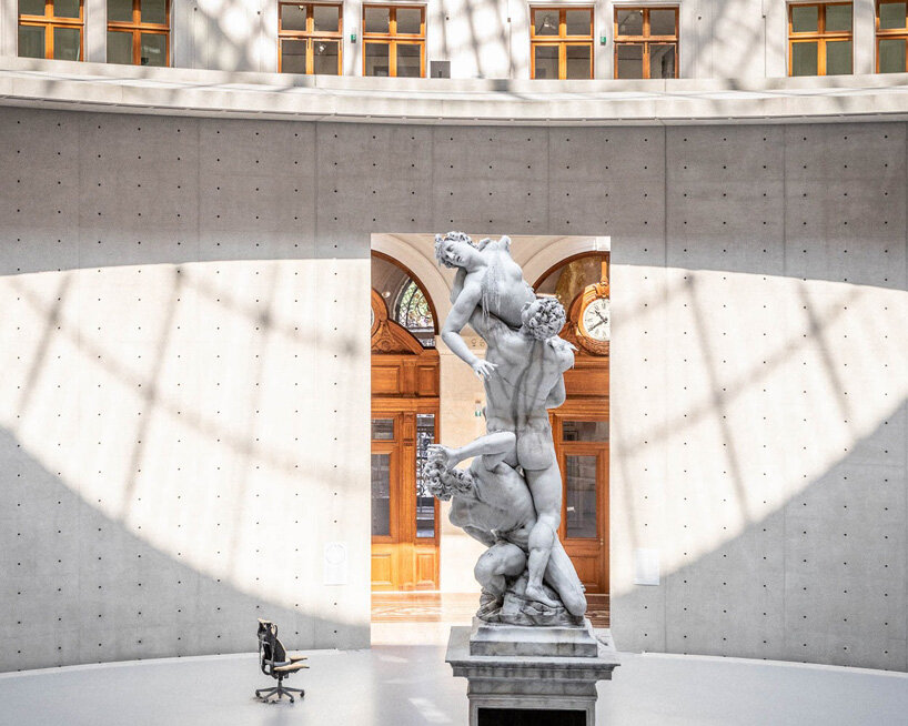 urs fischer ephemeral wax sculptures are burning inside the bourse de commerce in paris