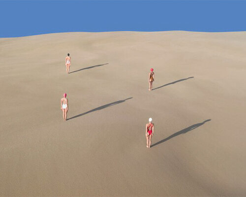 brad walls captures women on sand dunes in new conceptual aerial photo series