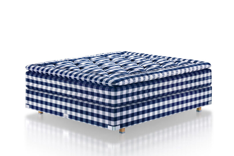 hästens bed in the iconic blue check