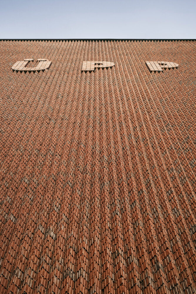 the material of the elevations echoes the brick of the existing buildings