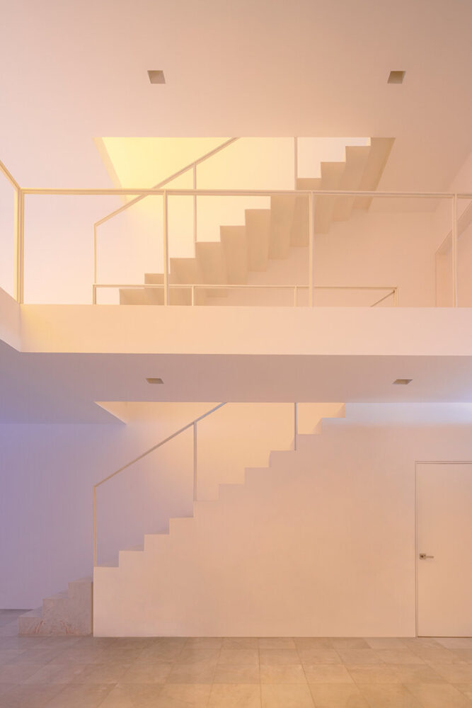 the two double heights intertwine and connect the whole house