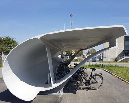 denmark is repurposing discarded wind turbine blades as bike shelters
