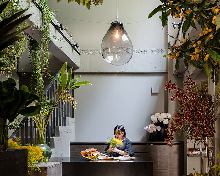 mosaic tiles + glass partitions decorate this residence turned flower shop in tokyo