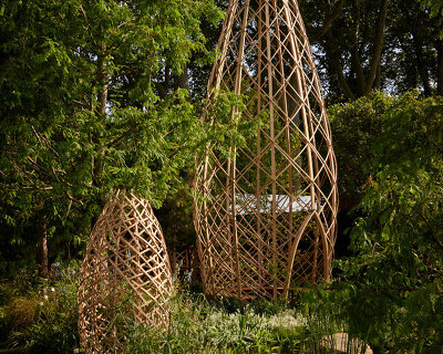 xylotek's bamboo towers at chelsea flower show are for 'wildlife and humans alike'