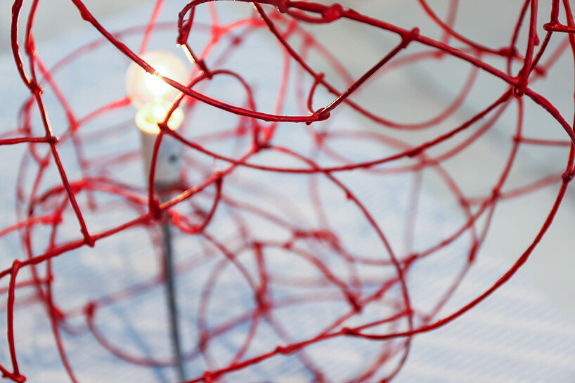 bulge lines gray and red by norihiko terayama image © designboom