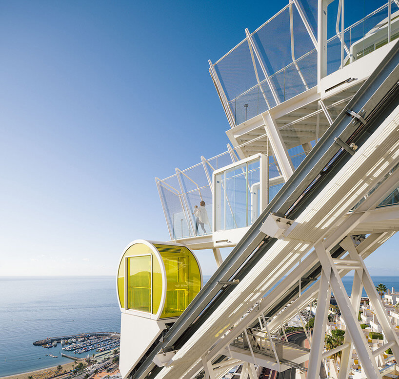 lopezneiraciaurri architecture installs bright yellow funicular on neglected 70s hotel in gran canaria