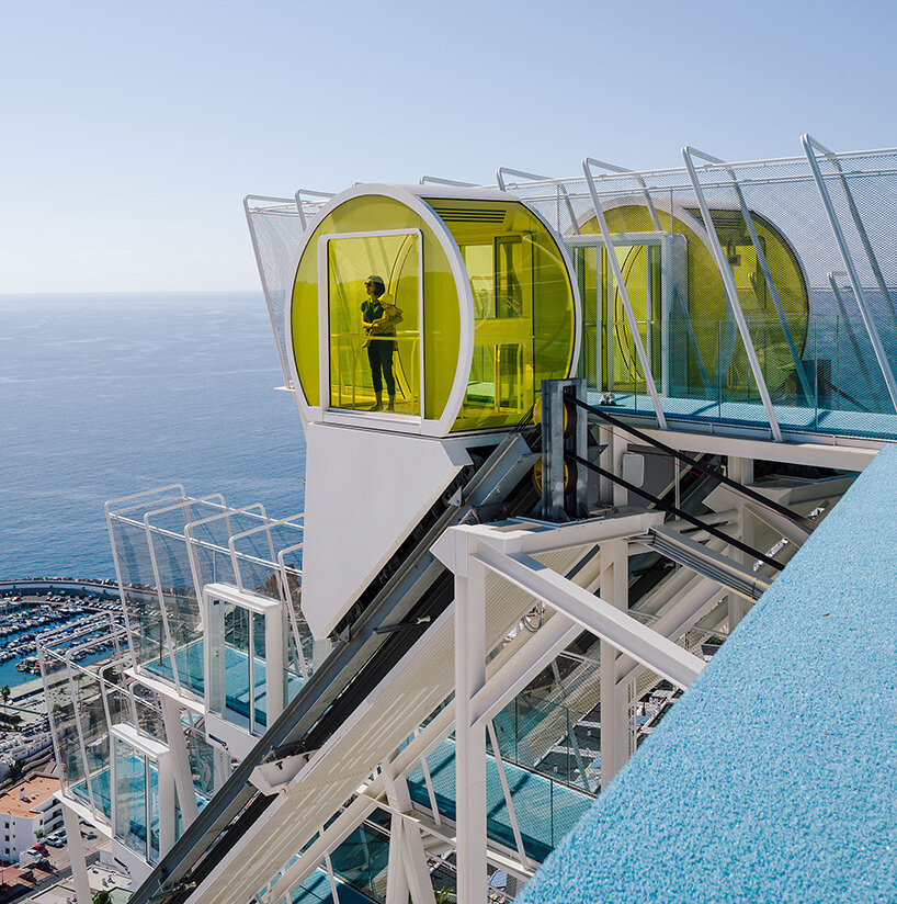 lopezneiraciaurri architecture installs bright yellow funicular on neglected 70s hotel in gran canaria