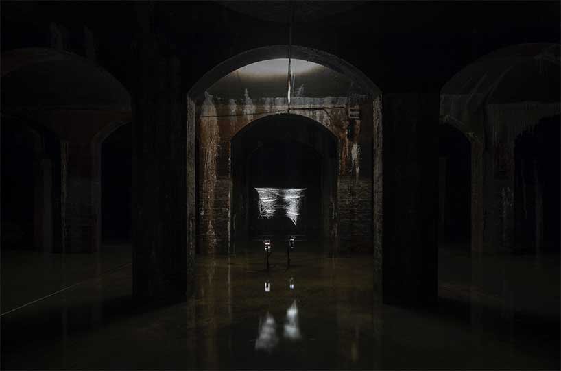 luminous spheres hover within tomás saraceno's floating exhibition in cisternerne