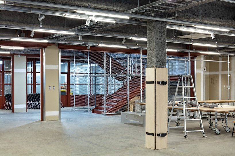 schemata architects installs adaptable display system in new art university building in tokyo