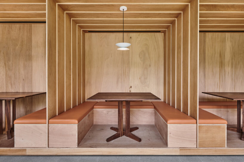 the boxed seats are almost like a gazebo encouraging the guests to look out to the garden