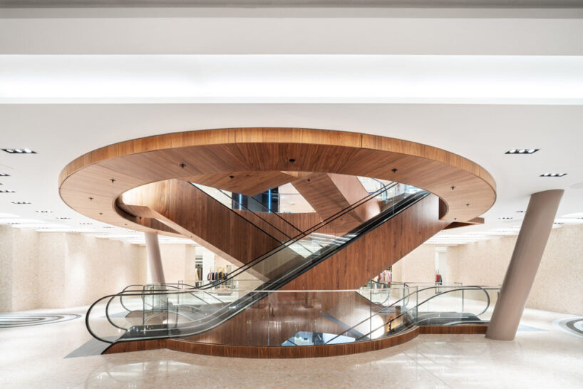 the wooden escalators serve as a focal point within the store