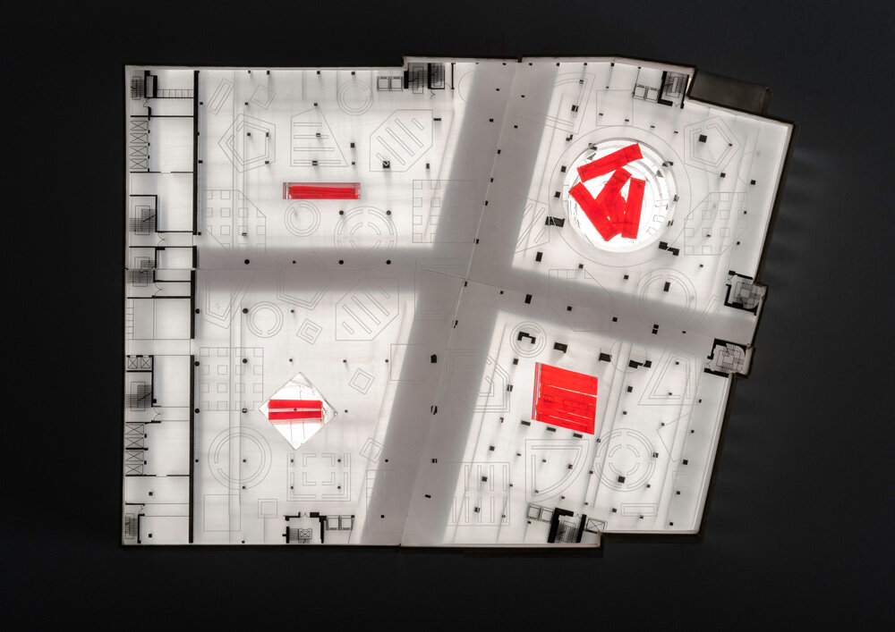 core voids organize the space, each acting both as a central atrium and a primary vertical circulation space | image courtesy OMA