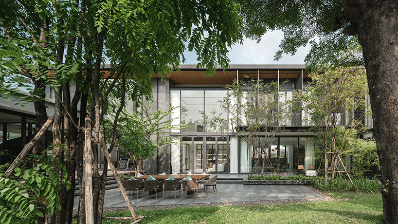 anonym studio builds a transparent and modern family house in thailand