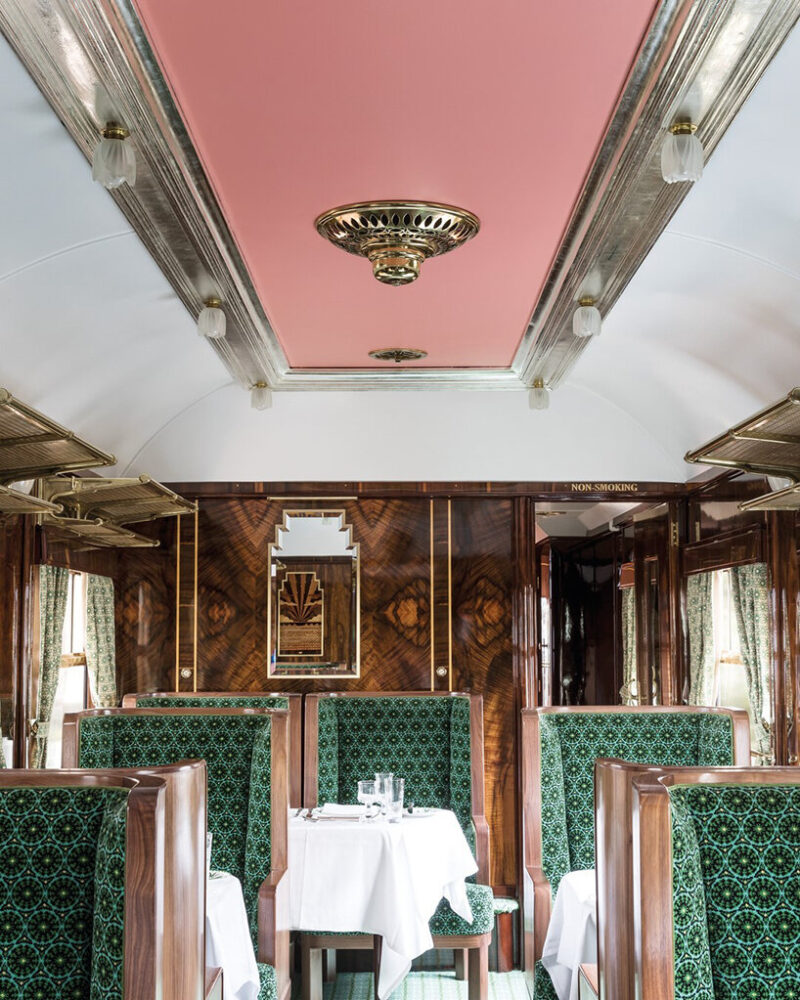 wes anderson revives 1950s train carriage inviting visitors into whimsical film sets