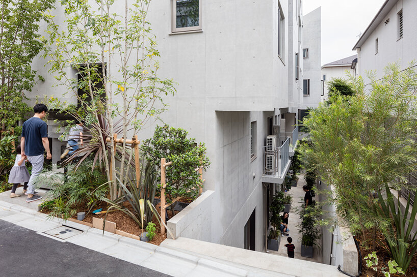 furuya design’s hanegi + housing is an array of angled, floating volumes in tokyo