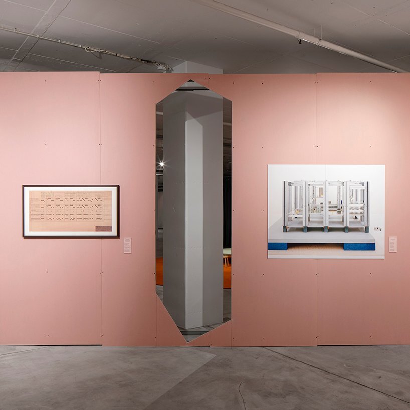 the exhibition design promotes playful moments that enable a continuous relationship between the different sections. here, the wall reveals the existing structure of garagem sul and the section behind.