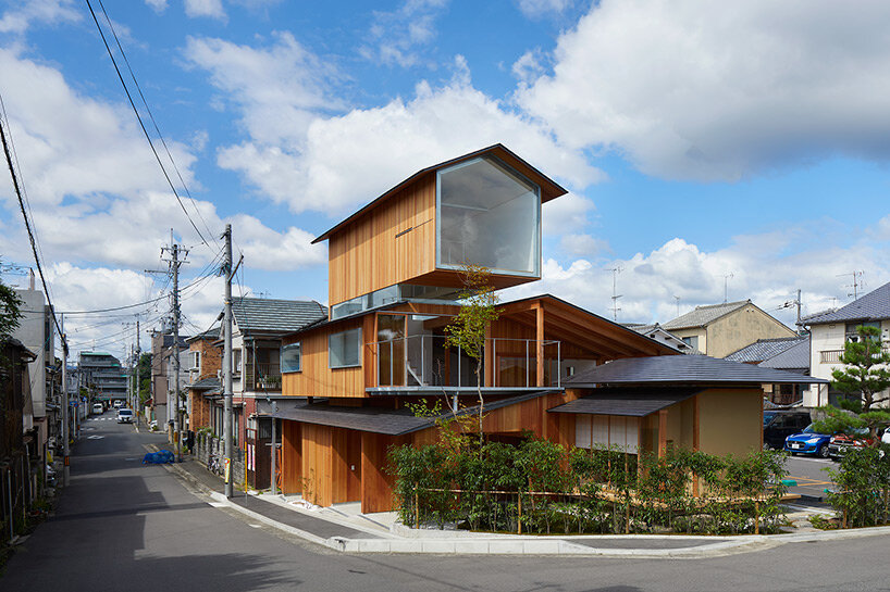 tomohiro hata shapes house in shimogamo, japan, as an arrangement of overlapping roofs