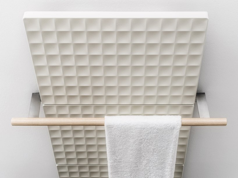 the wooden handle makes the radiator extremely functional in the bathroom