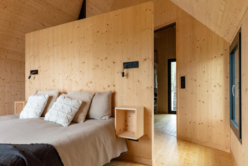 the bed is hidden behind two partitions