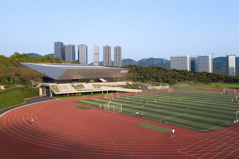 URBANUS' new gymnasium in china blurs the spatial boundaries between sports and leisure