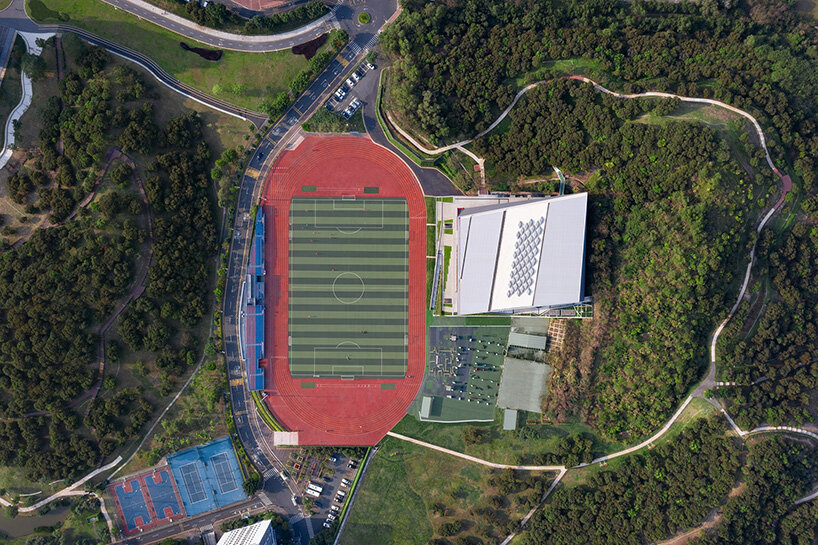 URBANUS' new gymnasium in china blurs the spatial boundaries between sports and leisure