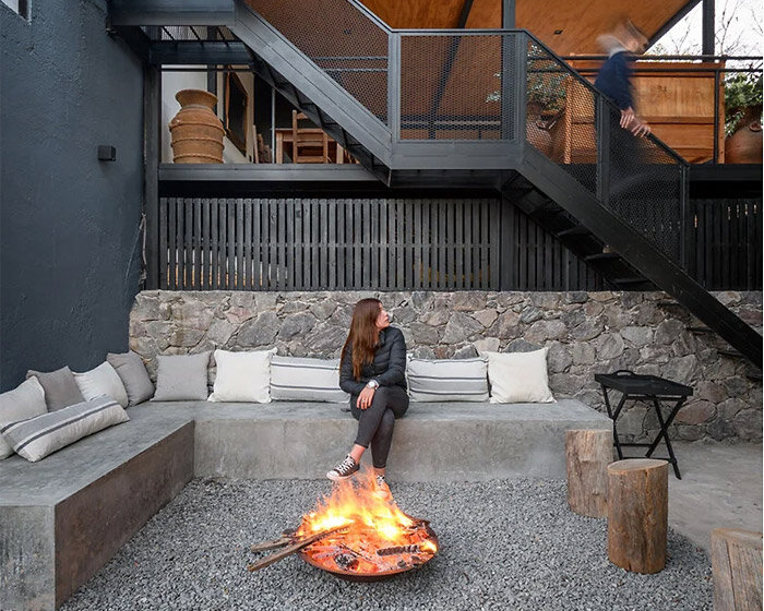 SET ideas revives stone dwelling with metal framework 'fluid house' intervention